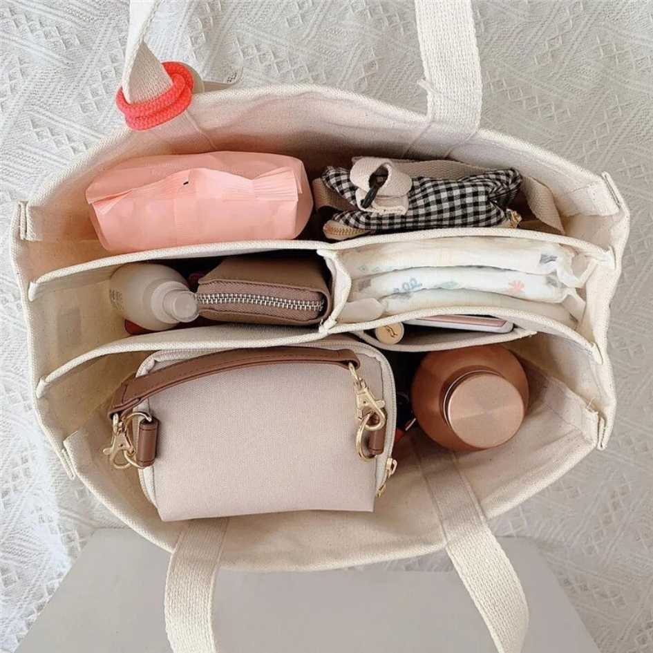 petit-sac-a-langer-beige-ergonomique